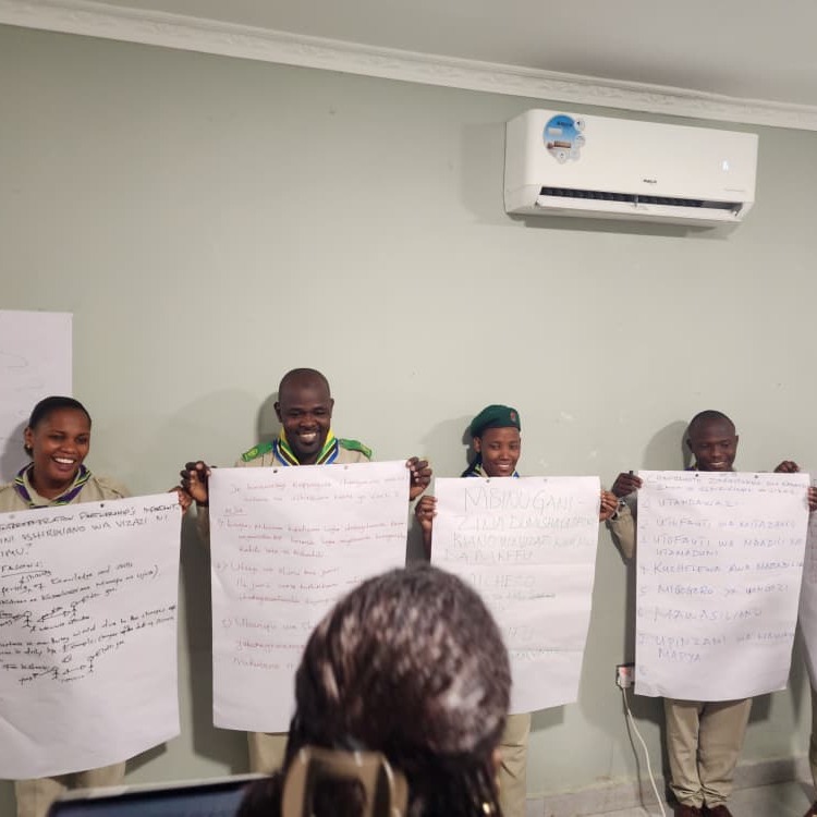 Empowering the Next Generation: Tanzania Hosts Landmark International Scout Leadership Training in Dar es Salaam
DAR ES SALAAM, Tanzania – In a significant move to bolster youth leadership across the region, the Tanzania Scouts Association (TSA), in collaboration with the World Organization of the Scout Movement (WOSM), successfully concluded a high-impact International Leadership Training (ILT) program earlier this year. Held from February 16th to 18th in the heart of Dar es Salaam, the three-day summit brought together 32 dynamic young Scouts. In a unique approach to ensure deep cultural immersion and inclusivity, the sessions were delivered entirely in Kiswahili, allowing participants to engage profoundly with the core curriculum and each other.

The training, supported by the World Scout Foundation and the Eric Frank Trust, was designed to transition young leaders from traditional problem-solvers into visionary "changemakers." Under the expert guidance of WOSM Consultant Ivy Karushi, Ms Grace, participants were immersed in an adaptive learning environment that emphasized leadership resilience, project management, and social entrepreneurship. A key highlight of the event was the "Project Clinic," where young Scouts presented innovative initiatives—ranging from sustainable agribusiness models to community service projects—receiving peer-driven feedback to refine their impact.

Complementing the academic and leadership modules, the event featured practical insights from prominent Tanzanian social entrepreneur Simon Mtambai, who shared real-world strategies for scaling grassroots ideas into sustainable ventures. This training serves as a cornerstone of the Tanzania Scouts Association’s broader Growth Strategy, aiming to equip the youth with the "outdoor readiness" and service-oriented mindset required to lead Tanzania into a prosperous future. As participants return to their respective districts, they carry with them not only enhanced skills but a renewed collective commitment to regional development and social transformation.